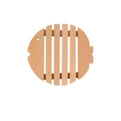 China Fish Shape Sustainable Heat Insulation Wooden Kitchen Pad For Dish Pot Beech Wood Table Mat Serving Tray for sale