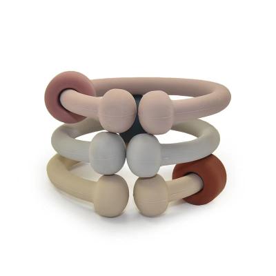 China Custom Eco-Friendly Silicone Sensory Wooden Baby Teether Teething Toy Ring for sale