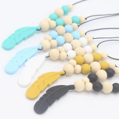 China Autism Soft Colorful Sensory Chew Toy Babys Silicone Teether Kids Christmas Toys Oral Motor Therapy Tools Teething Necklace for sale