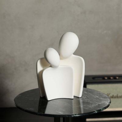 China Elevate Your Space with Unique Bamboo Abstract Lovers Statue Ceramic Art Sculpture for sale