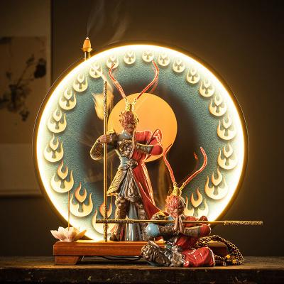 China Indoor Decor Sculpture Electric Incense Burner with LED Light and Customized Color for sale