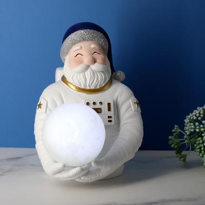 China Modern Morden Luxury Resin Astronaut Night Lights for Christmas Santa Claus Gifts for sale