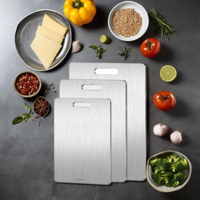 China Dual-Sided Cutting Board Stainless Steel and Bamboo Chopping Block for Durable Kitchenware for sale