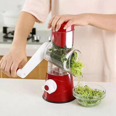 China Compact Handheld Plastic Vegetable Chopper Cheese Shredder Spiral Cutter for Stocked for sale