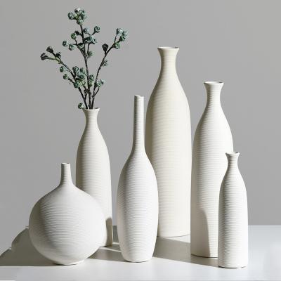 China Classy White Ceramic Tabletop Vase for Home Decor Ornaments Living Room Dining Table for sale