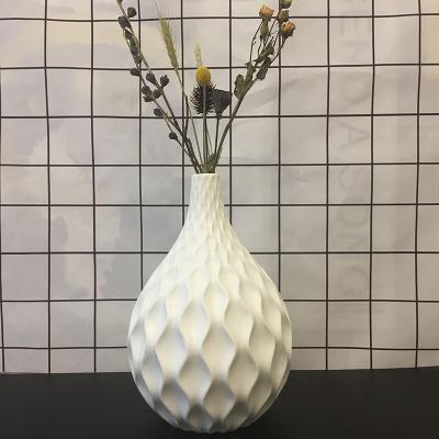 China Modern Nordic Sky Blue Striped Embossed Ceramic Vase for Home Hotel and Restaurant Decor for sale