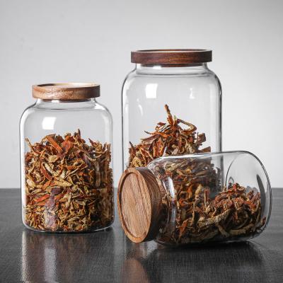 China Convenient Food Seasoning Container in Classic Design with Large Glass Jar and Wooden Lid for sale