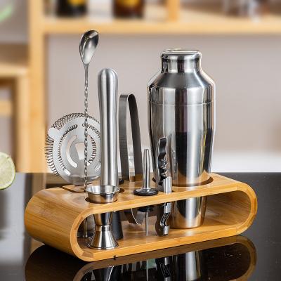 China Stainless Steel Shaker and Bamboo Tongs Clubs Design Wooden Stand with Disposable Utensils for sale