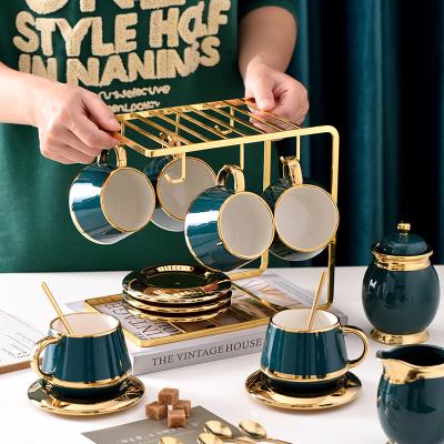 China Stocked European Style Ceramic Gold Edge Coffee Cup Set With Saucer And Cup Holder for sale