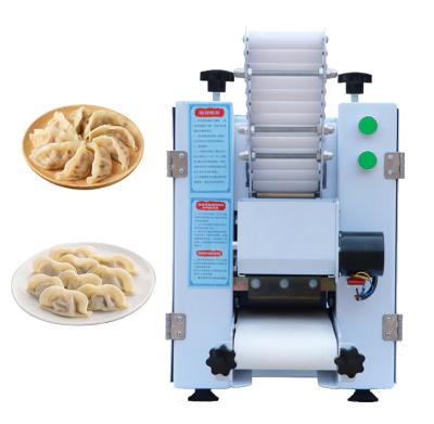 China High quality automatic casting stainless steel automatic dumpling making machine for sale/high capacity samosa gyoza dumpling making machine for sale