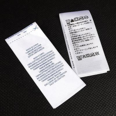 China Sustainable Fashion Custom Printed Logo Tags Center Folded Washing Instruction Neck Satin Key Care Labels For T-shirts for sale