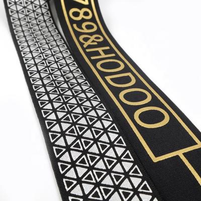 China Brand Logo Golden Silver Metallic Silk Elastic Customized Screen Printed Woven Jacquard Webbing Elastic Bands For Clothing for sale