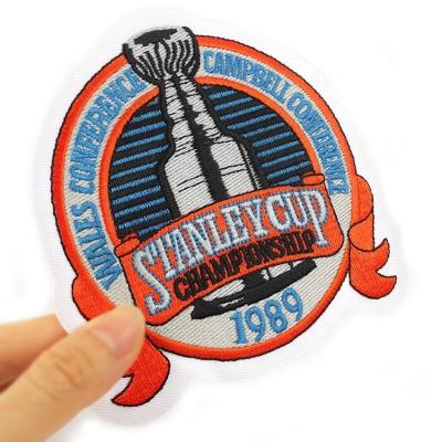 China 3D Wholesale Custom Brand Logo Ice Hockey Sportswear Embroidery Patches For Uniform for sale