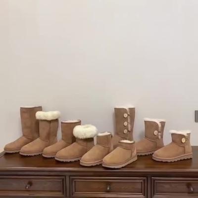 China Round Wholesale Winter fluffy and soft Women's Designer Brand snow Boots Women Designer Luxury fur Boots for sale