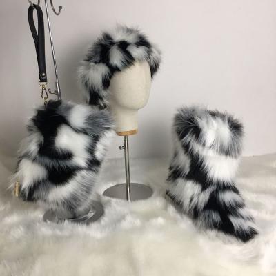 China Round Factory Wholesale Winter Adult And Kids Faux Fur boot Set Fluffy Warm raccoon fur boots mongolian fur boots for women for sale