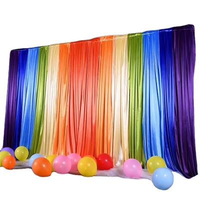 China New Cheap Stage Decoration Rainbow Wedding Party Ice Silk Stage Curtain for sale