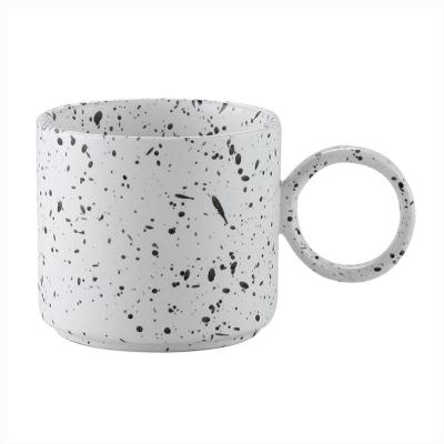 China Viable Design Creative Gift Set Custom Logo Nordic Ceramic Tea Cup Stone Coffee Mug With Unique Handle for sale