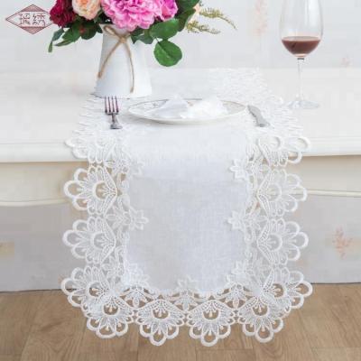 China High quality100% polyester disposable white tapa embroidered lace trim table runner for sale