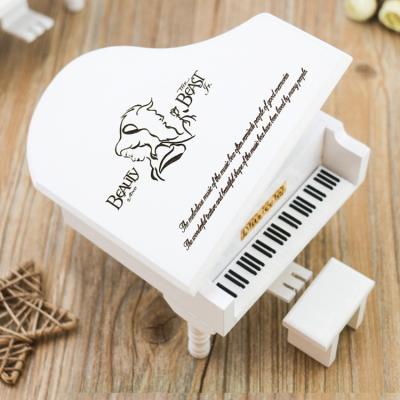 China Wholesale Funny Gift Roll Up Toys Beauty and Beast Piano Music Box for sale