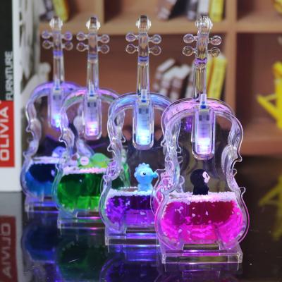 China Creative Crystal Acrylic Violin Drop Cellofloating Table Pendant Acrylic Oil Leak Animal Night Lamp Toy Gift Luminous Oil Drop for sale