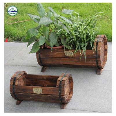 China Waterproof Decorative Wooden Flower Pot Brown Wooden Garden Planter Barrel for sale