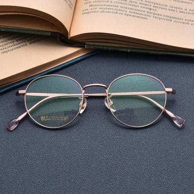 China Beauty High Quality Pure Titanium Round Lens Women Men Titanium Frame Eyeglasses Optical Glasses for sale