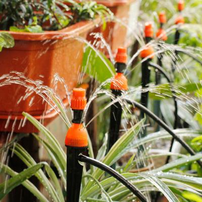 China Hot Sale Fruit Tree Drip Tape Mount Drip Irrigation Adjustable On Line Drip Device 8 Hole Irrigation Insert Drip Device for sale