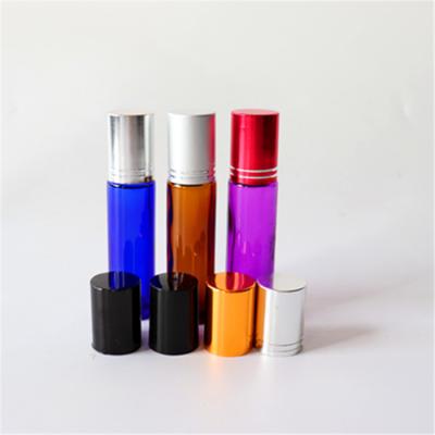 China Personal Care Box Packaging 10ml Roll-On Perfume Bottle 10ml Amber Glass Roll On Bottle With Metal Trackball for sale