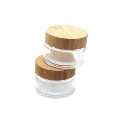 China 5g cosmetic 15g 30g 50g 100g 200g clear frosted glass bamboo cosmetic cream jar with bamboo spoon lid for sale