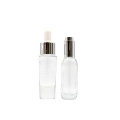 China Cosmetic Clear Serum Bottle Dropper Cosmetic Oil Essence Essential Oil Bottle for sale