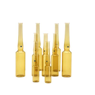 China 2ml 5ml 10ml amber glass ampoule bottle mini essential oil glass bottles wholesale cosmetic empty vial bottle for sale