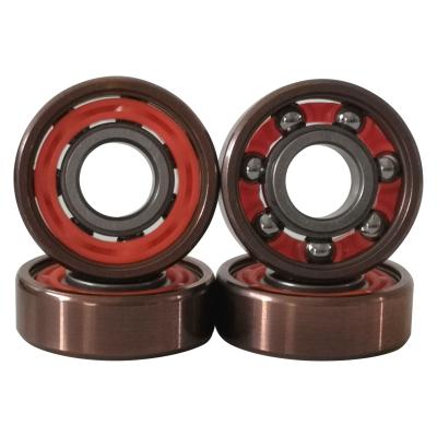 China Good Custom Mixed Color Skateboard Sale Titanium Skateboard Bearings RoseGold-Silver for sale