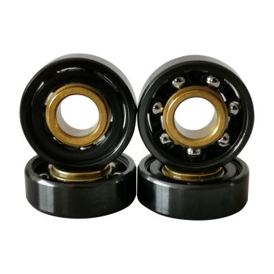 China 608zz Skateboard Machinery Spare Parts Miniature Mixed Color Black-gold Titanium Skateboard Bearing,E Skateboard Parts for sale