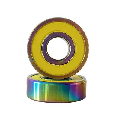 China Colorful Skateboard Titanium Coated Deep Groove Ball Bearings For Skate 6 Ball Si3N4 Ceramic Bearings for sale