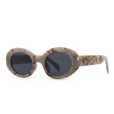 China Fashion sunglasses European and American trend street shooting oval lens black marble pattern resin sunglasses for sale