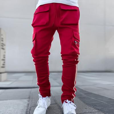 China Mens Joggers Gym Wear Breathable White Pants Running Pants Plus Size Pockets Casual Multi Size Sweatpants Men's Reflective Trousers for sale