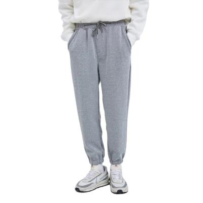 China Anti-wrinkle winter sports and leisure pants men's urban single drawstring pockets plus fleece pants for sale