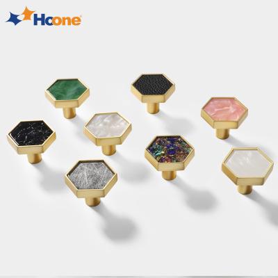 China Hoone Modern Euro Wholesale Modern Euro Shell Marble Hexagon Zinc Alloy Door Kitchen Pull Drawer Dresser Brass Fancy Knobs for sale