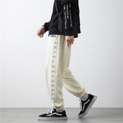 China Fashion Letter Print Design Fitness Sports Cargo QUICK DRY Quick Dry Man Pants Plus Size Cotton Pants for sale