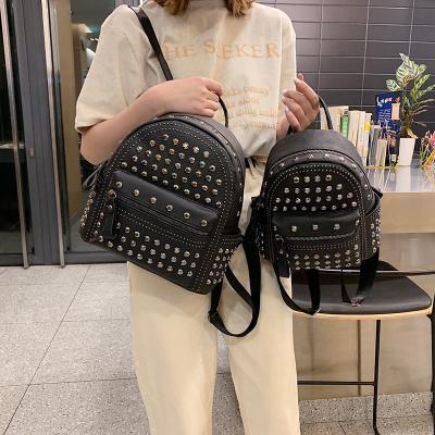 China 2021 Fashion Anti-theft Women's Backpack Mini Genuine Leather Personality Rivet Backpack Women Anti-theft Mochila Teenage Girls for sale