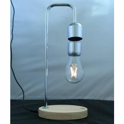 China Wooden Wooden Base Magnetic Floating Levitate Rotating Led Bulb Lamp For Decor Gift for sale