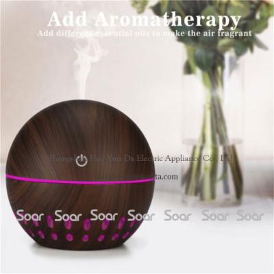 China Bestselling Comfortable Home Appliances 130ML Unique 7 LED Colors Wood Grain Diffuser Cool Mist Humidifier for sale