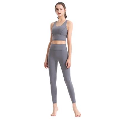 China Wholesale Breathable Gym Workout ClothingHight Waist Legging Sports Bra Women Workout Sets Seamless Yoga Set for sale