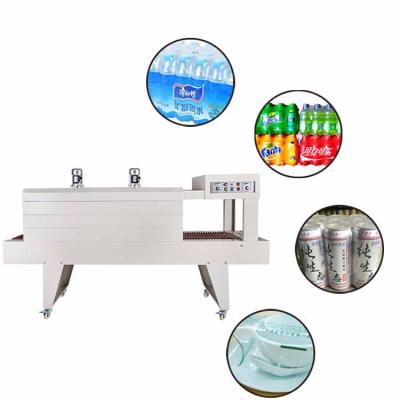 China Hot Selling Semi-automatic Mineral Water Packaging Machine PE Bottle Shrink Film Packaging Box Food Carton Heating Shrinking Machines for sale