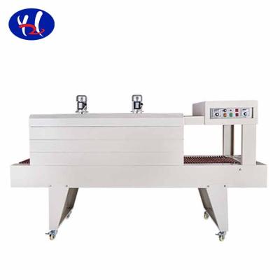 China Semi Automatic Food Beverage Wine Juice Milk Soft Drink Water Bottle Heat Sealing Sleeve Shrink Machine for sale