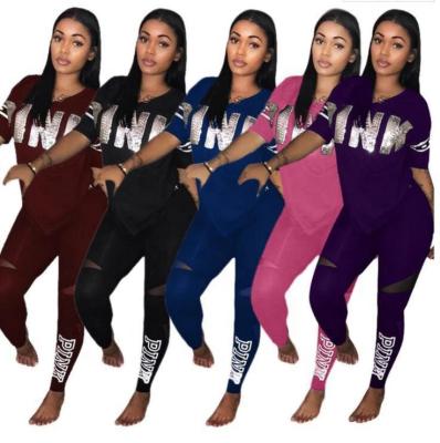 China Breathable Plus Size Women Casual Two Piece Set Letter Printing Pink Two Piece Set Women Clothing XM-2072898 for sale