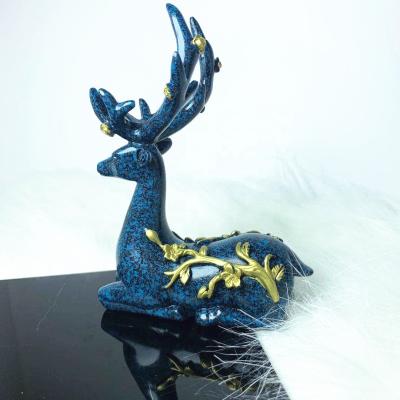 China Cheap Wholesale Blue Cheap Home Decorations Kneeling Antler Pedestal Resin Ball Europe Crystals Gifts for sale