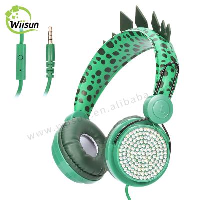 China Cute Wired Green Headband Earbuds Kids Headphones Green Dinosaur Wired Earbuds For Kids Girls Gifts for sale