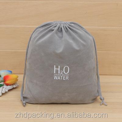 China Shock Resistance New Logo Gray Plush Drawstring Velvet Embossed Pouch For Jewelry With Logo for sale