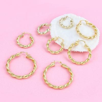 China 2022 Gold Aiwei Jewelry Initial Earrings Bargain Trendy Simple Stainless Hoop Circles Earring For Girls for sale